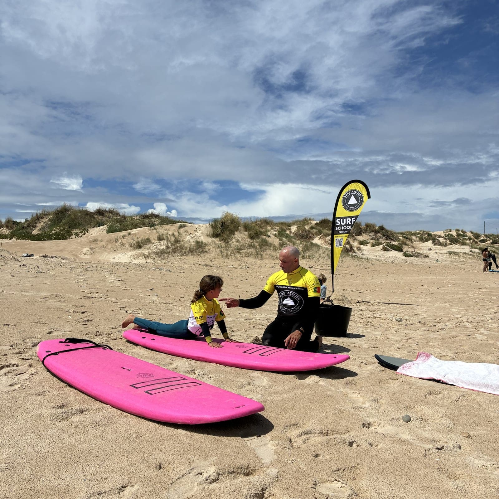 Surf lesson moment on the beach